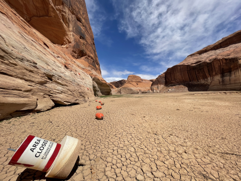 Drought on the Escalante Arm of Lake Powell leaves buoys protecting a granary high and dry