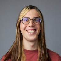 headshot of person in glasses